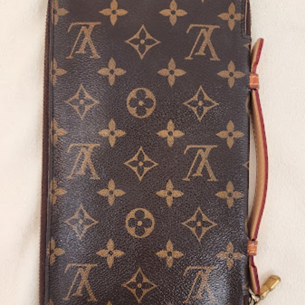 Louis Vuitton de Voyage Travel Organizer. Vachetta handle has been replaced